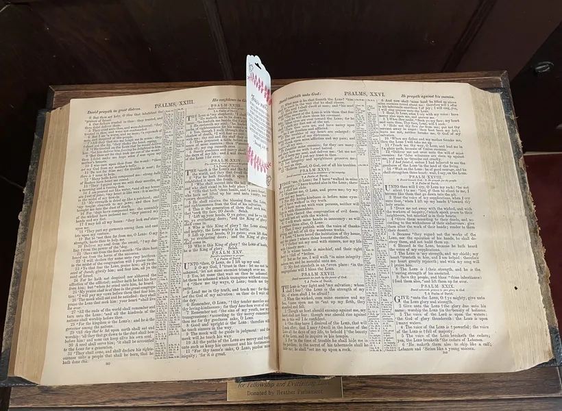 The church's old lectern Bible, open, with a ribbon marking the psalms