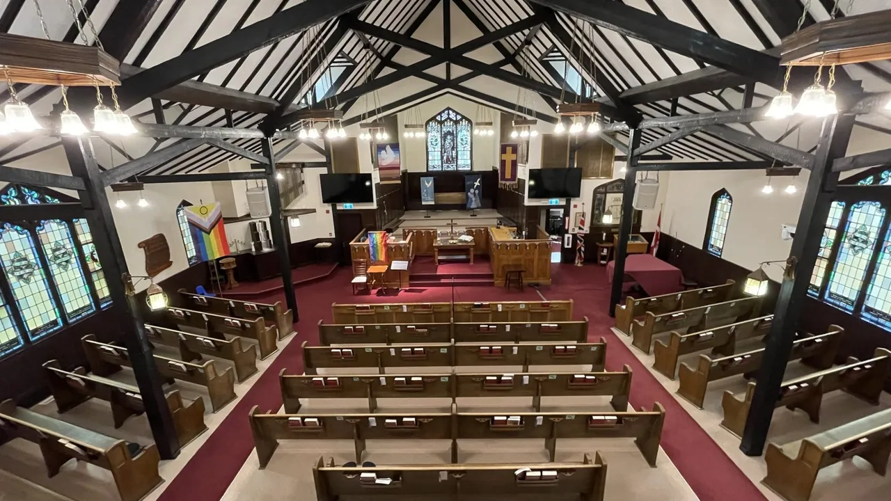 The sanctuary from the balcony, looking toward the chancel — the livestream camera's view